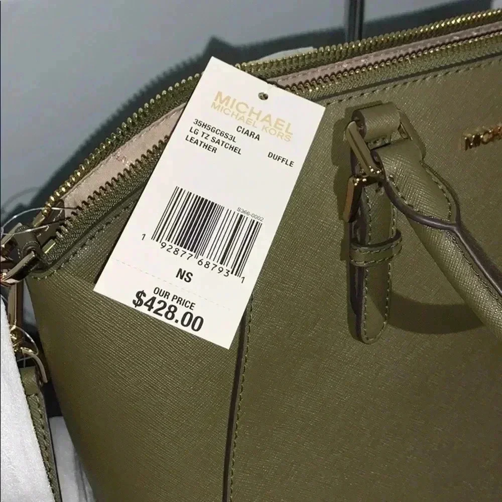 Michael Kors Ciara Duffle Solid olive green color